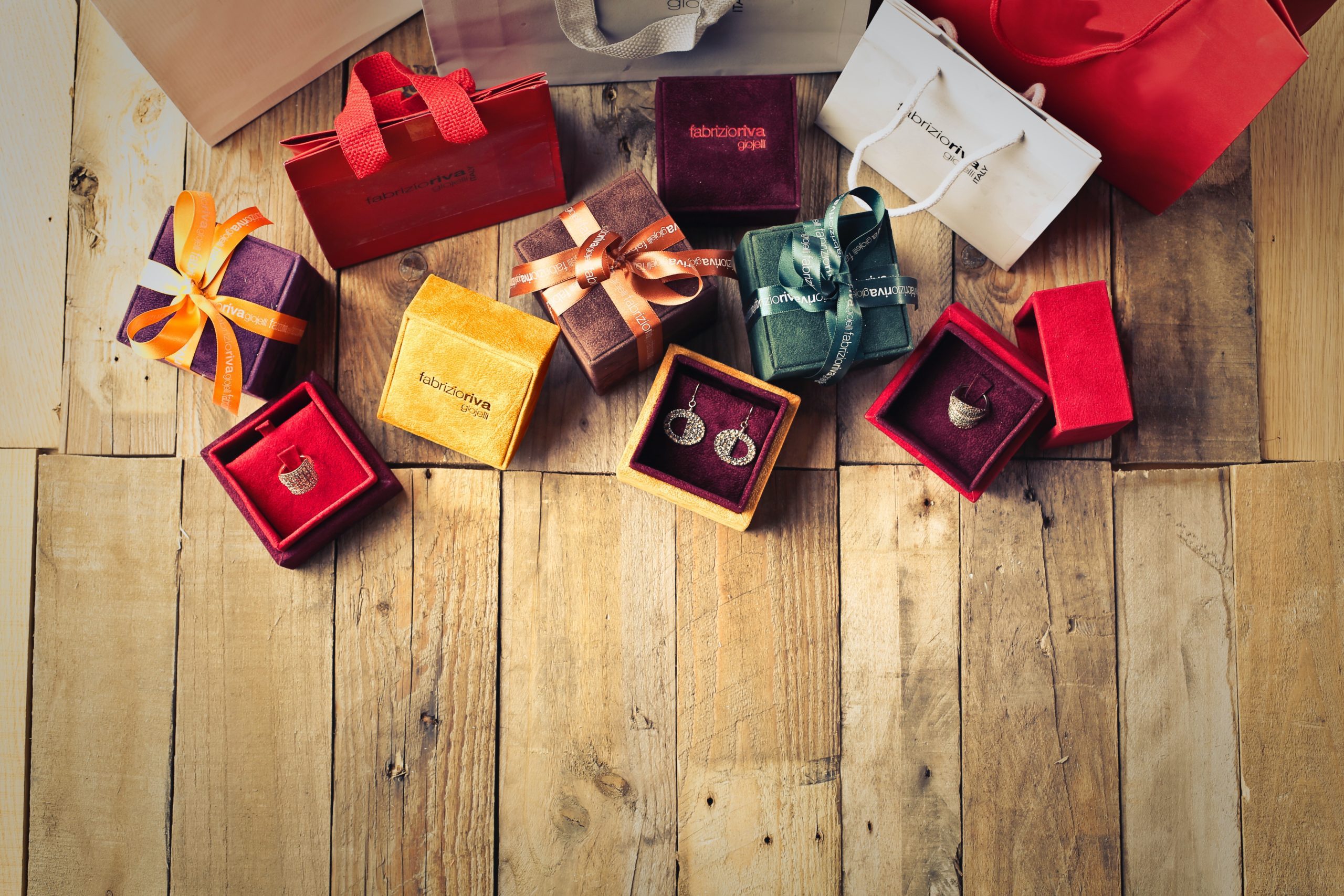 Wooden floor with gift boxes and jewellery