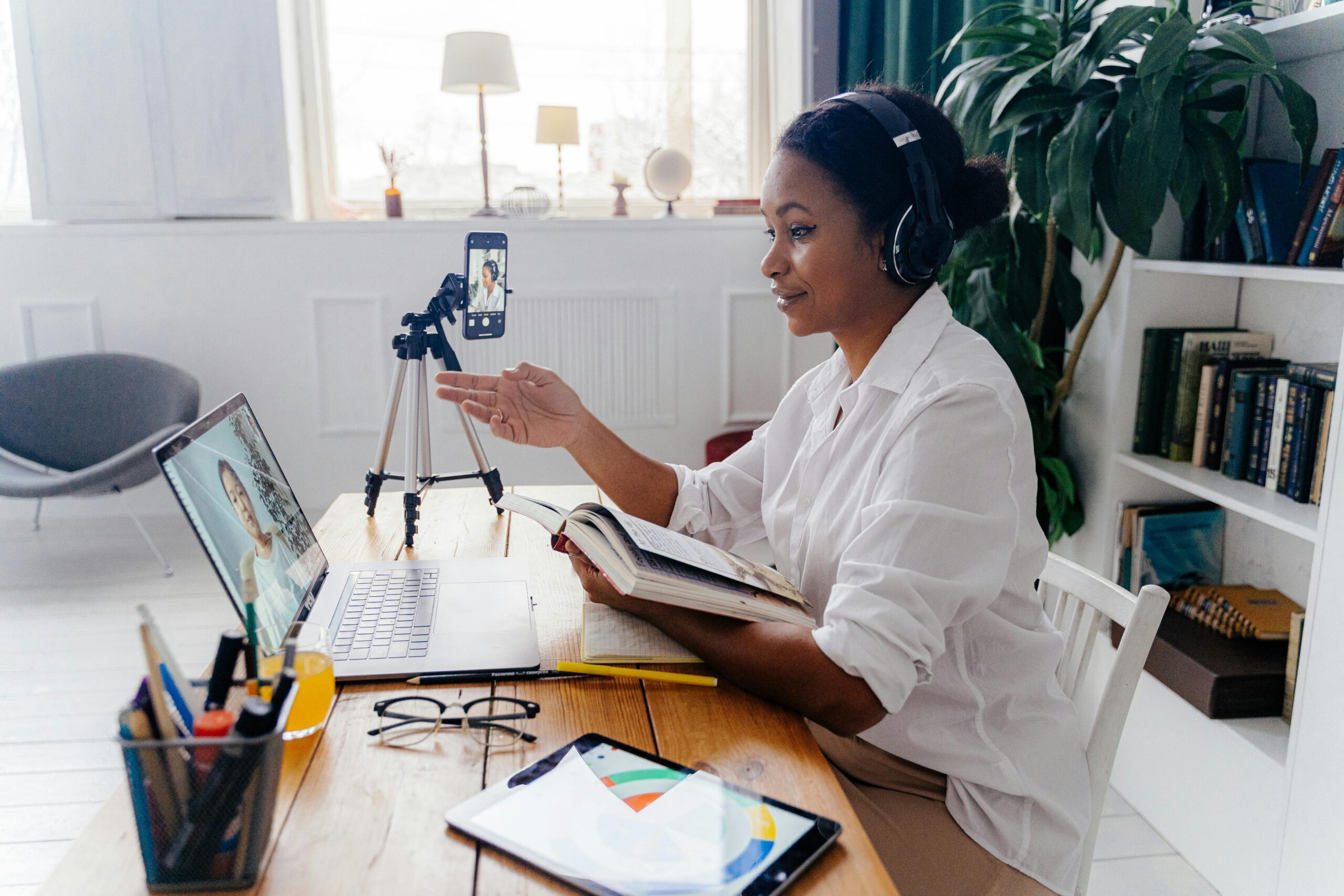 Woman at a desk discussing website accessibility via Zoom